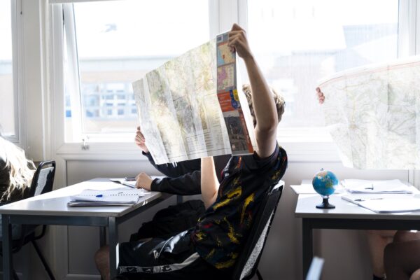 Student studying map