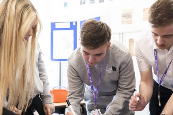 header_students-writing-135